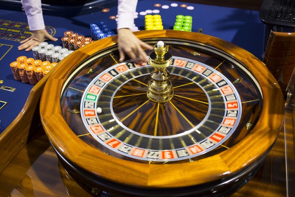 Wooden Roulette Table In Casino Ball
