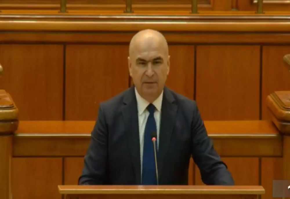 ILIE BOLOJAN ÎȘI APĂRĂ AUSTERITATEA ÎN PARLAMENT. GEORGE SIMION ANUNȚĂ MOȚIUNEA DE CENZURĂ